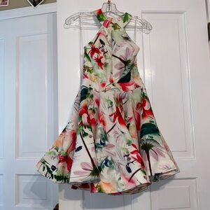 Beautiful floral dress with full skirt & chest/back cut out